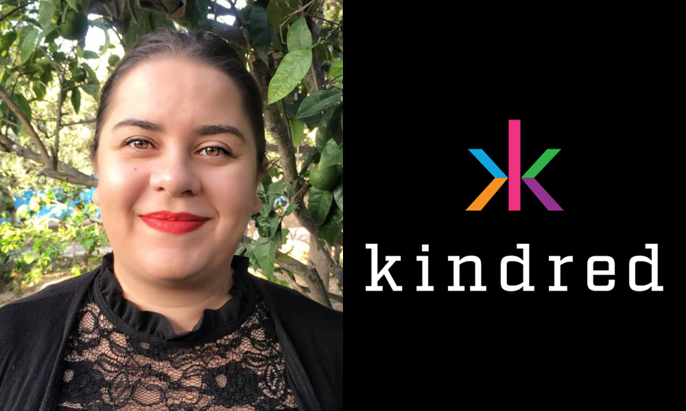 Maris Catania, Head of Responsible Gambling and Research at Kindred Group, is seen on the left: a pretty woman with dark brown hair pulled back, bright red lipstick, & a black lace top, smiling in front of green foliage. on the right is the Kindred logo